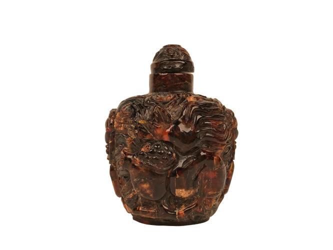 CHINESE CARVED AMBER SNUFF BOTTLE by 